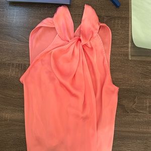 Pink silky sleeveless blouse
